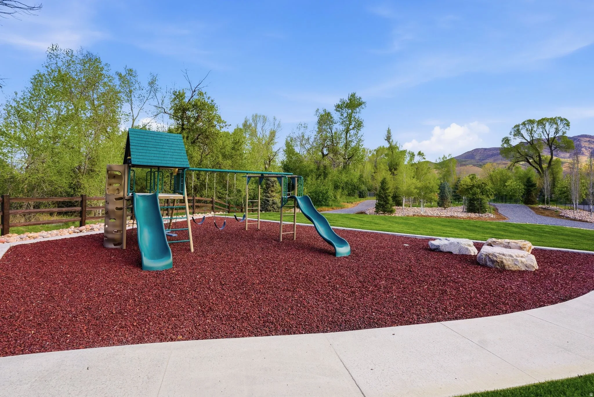 Community play area with a mountain view