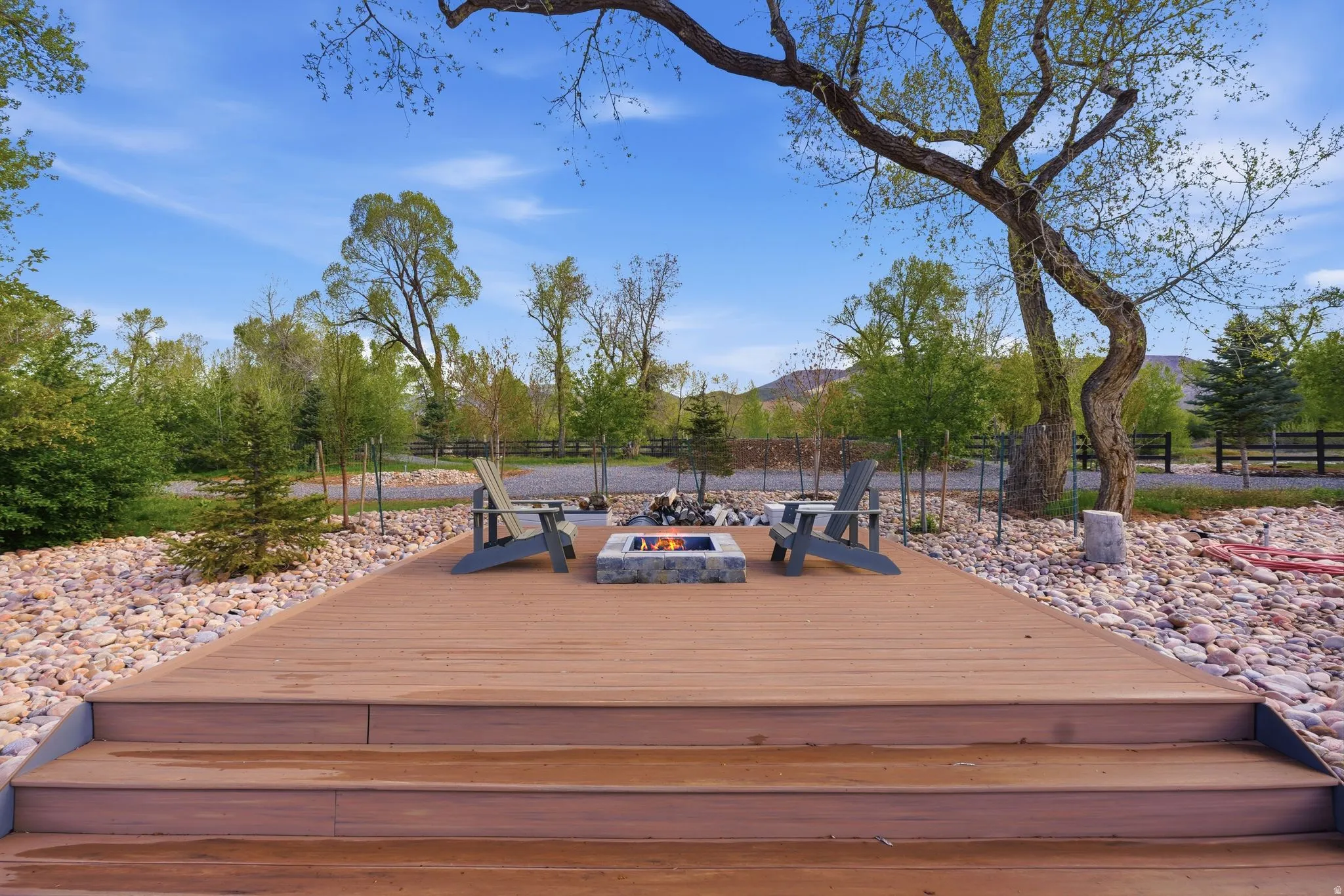 Deck featuring a fire pit