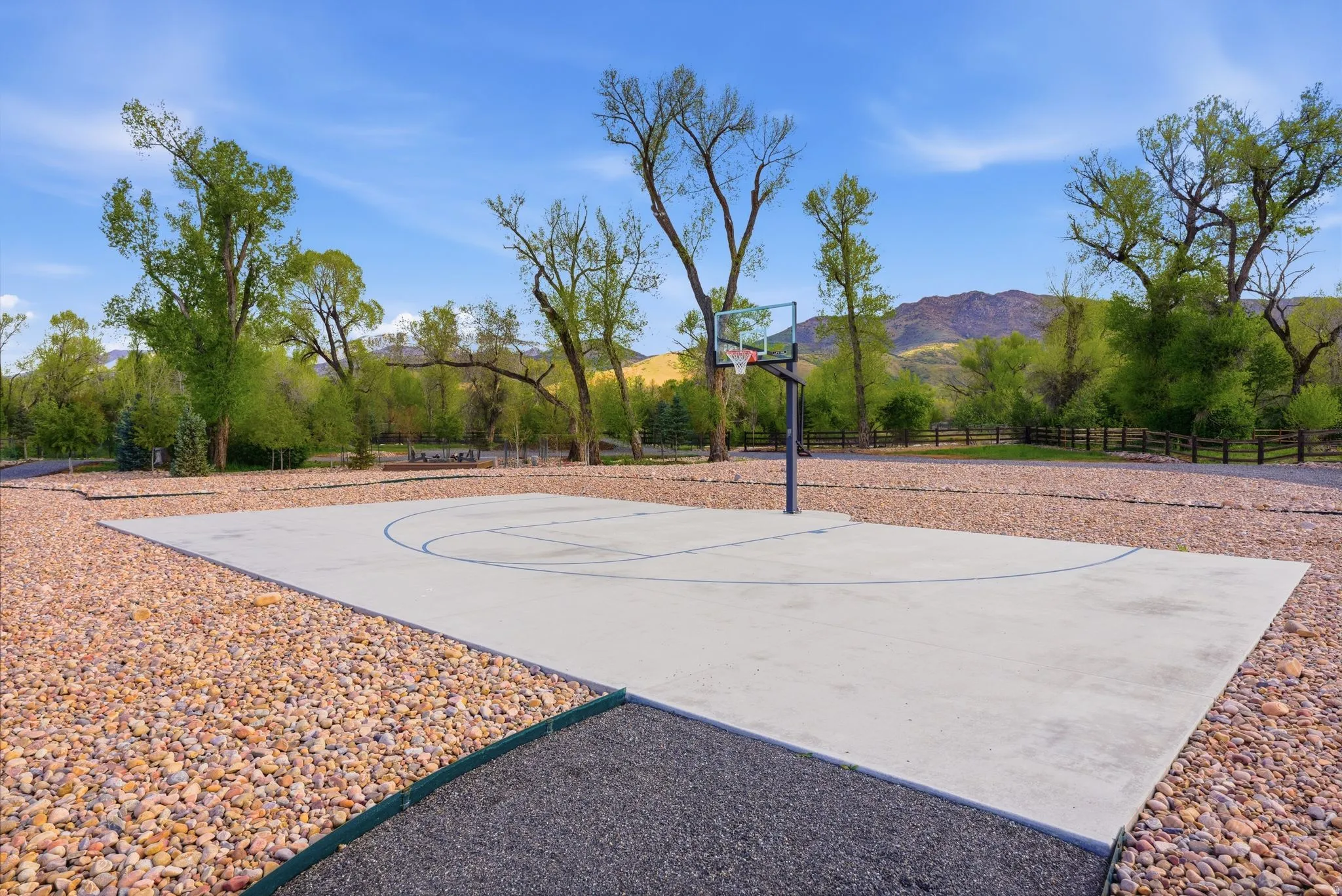 View of sport court featuring community basketball court and a mountain view