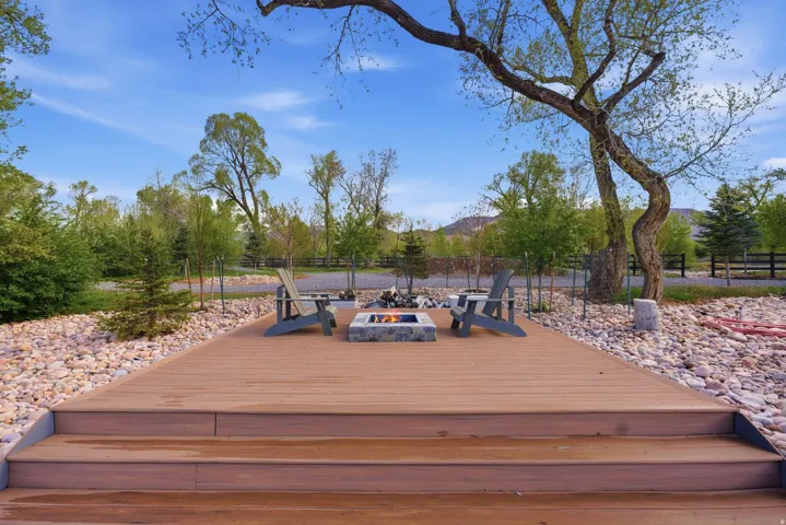 Deck featuring a fire pit