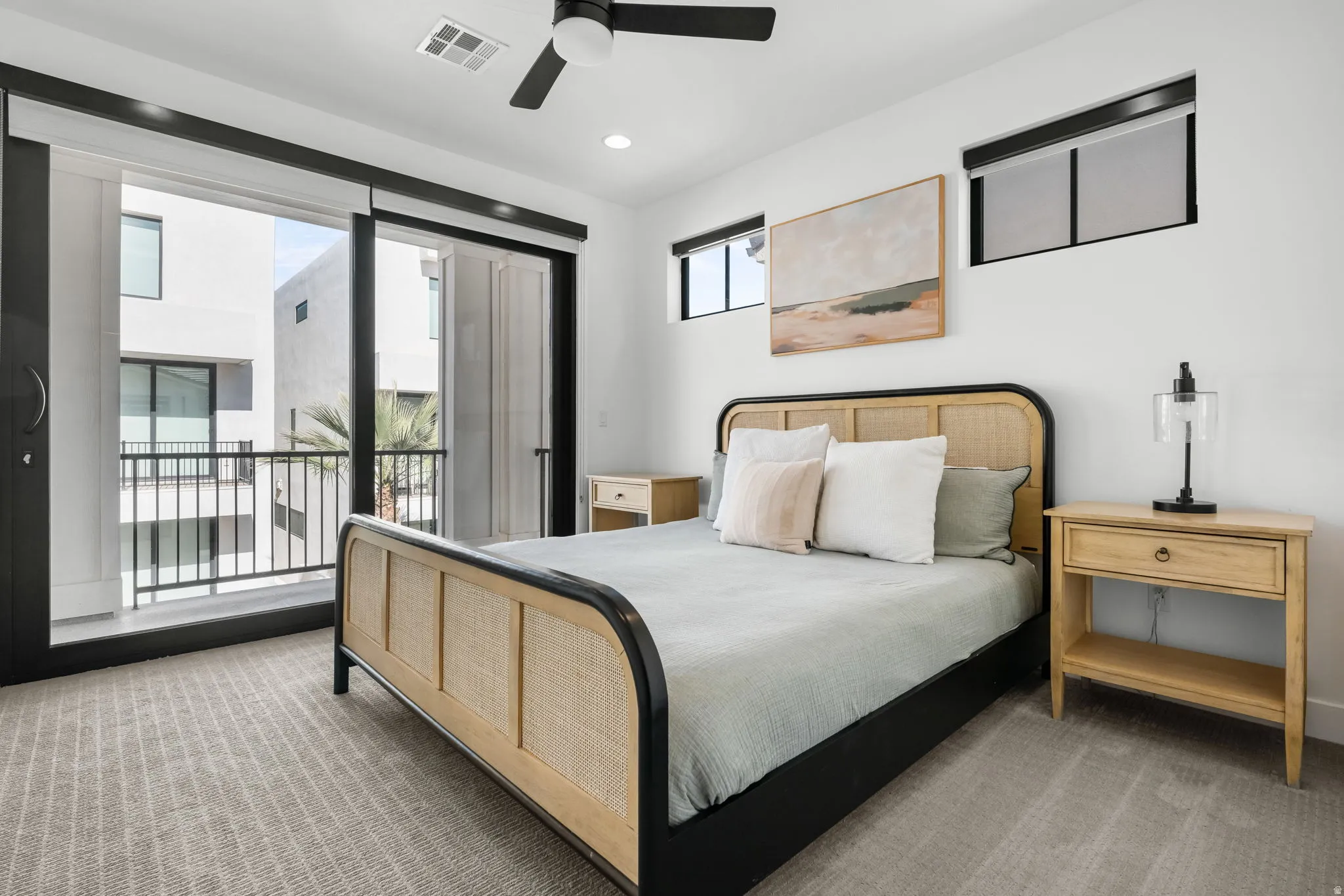 Bedroom featuring light colored carpet, access to exterior, ceiling fan, and recessed lighting