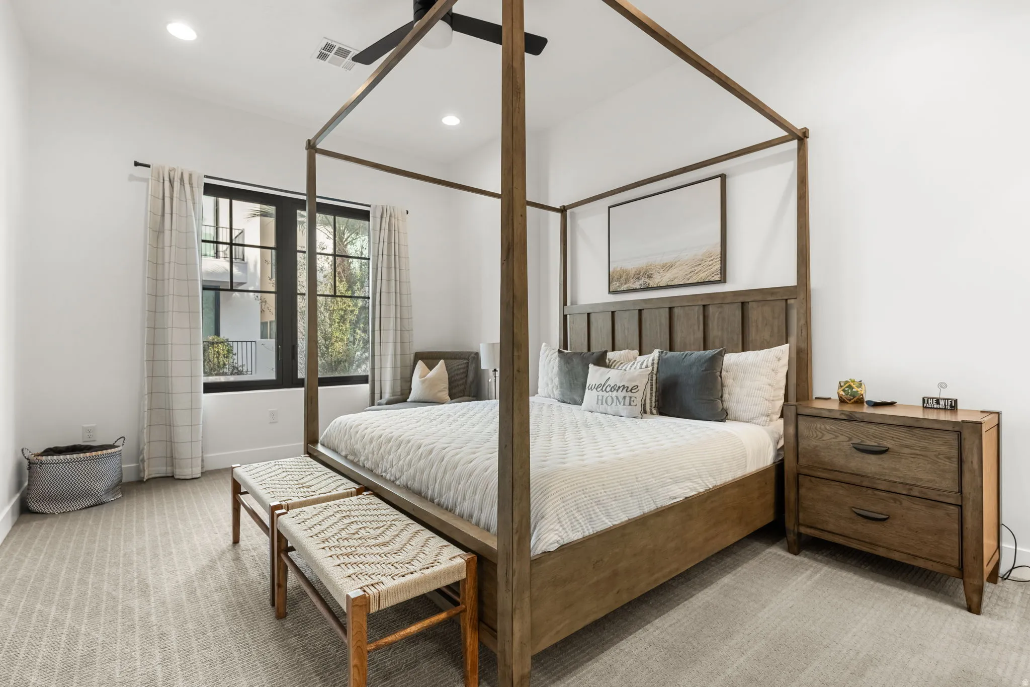 Bedroom featuring light colored carpet, recessed lighting, and ceiling fan