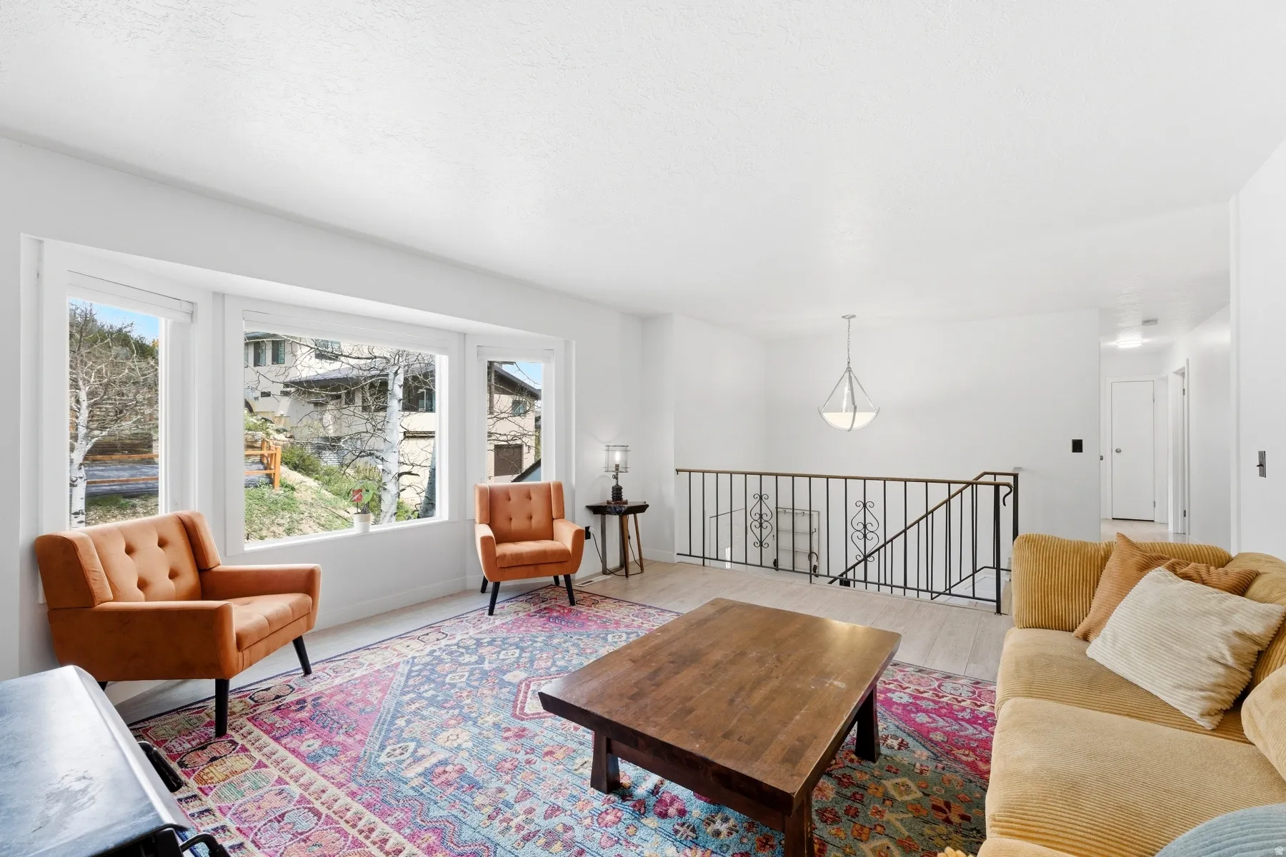 Living area featuring wood finished floors and baseboards
