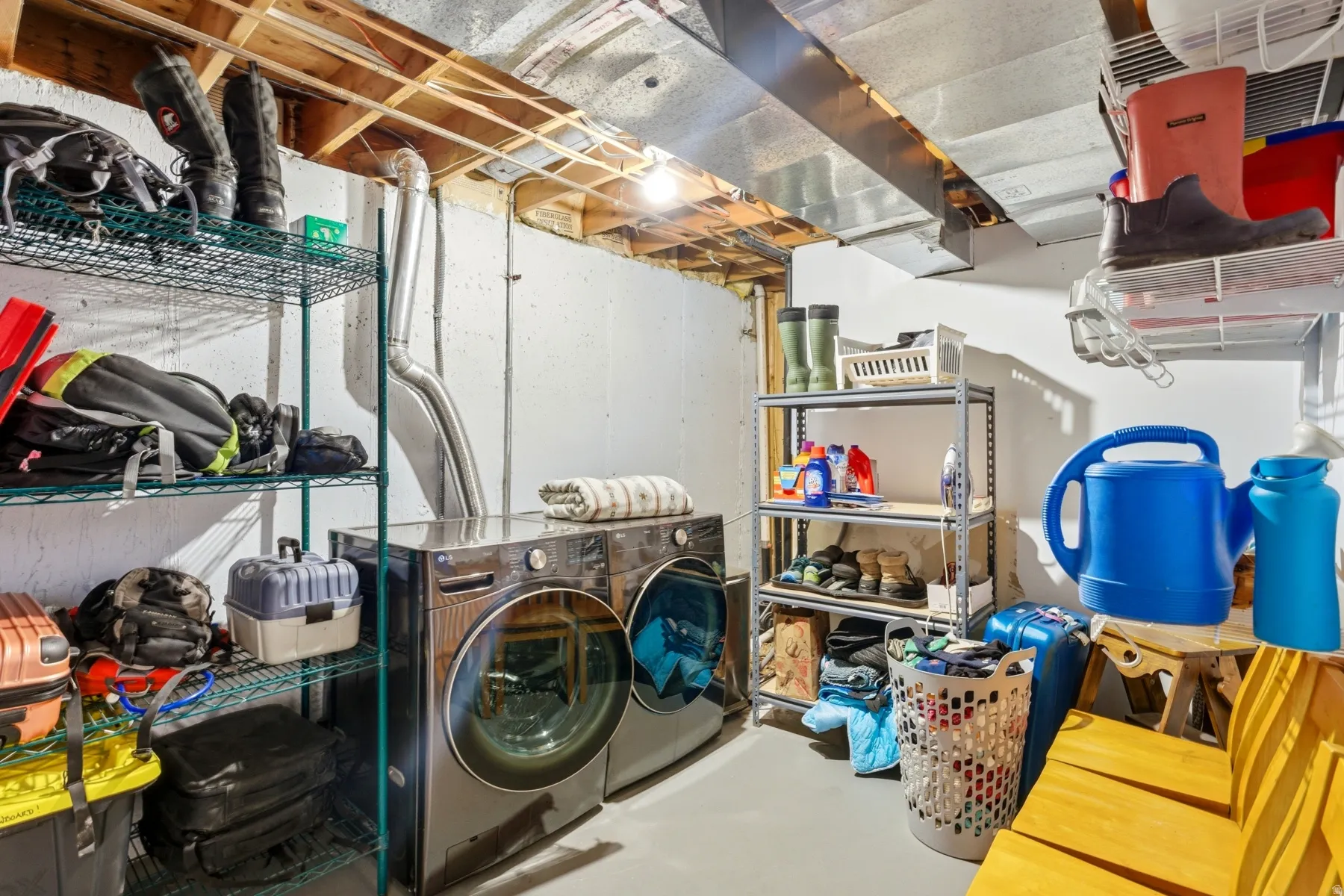 Storage area with separate washer and dryer