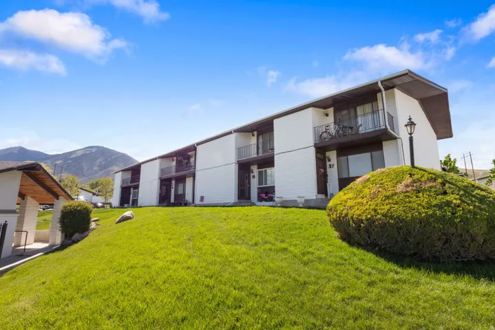 View of apartment building / complex with a mountain view