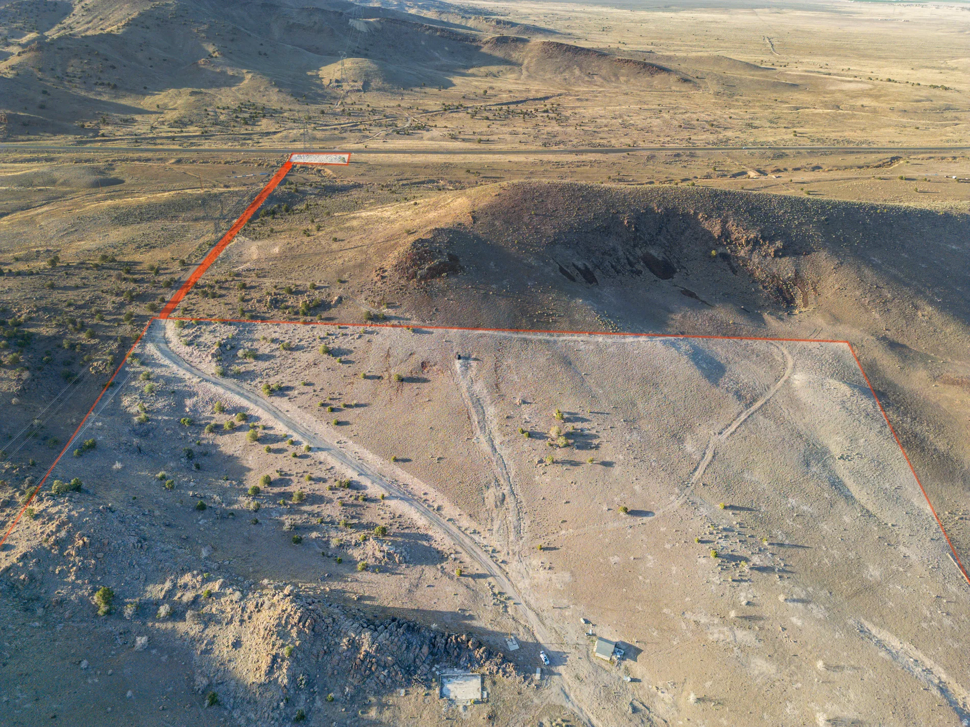 Overview of rural landscape featuring property boundaries highlighted and a desert landscape