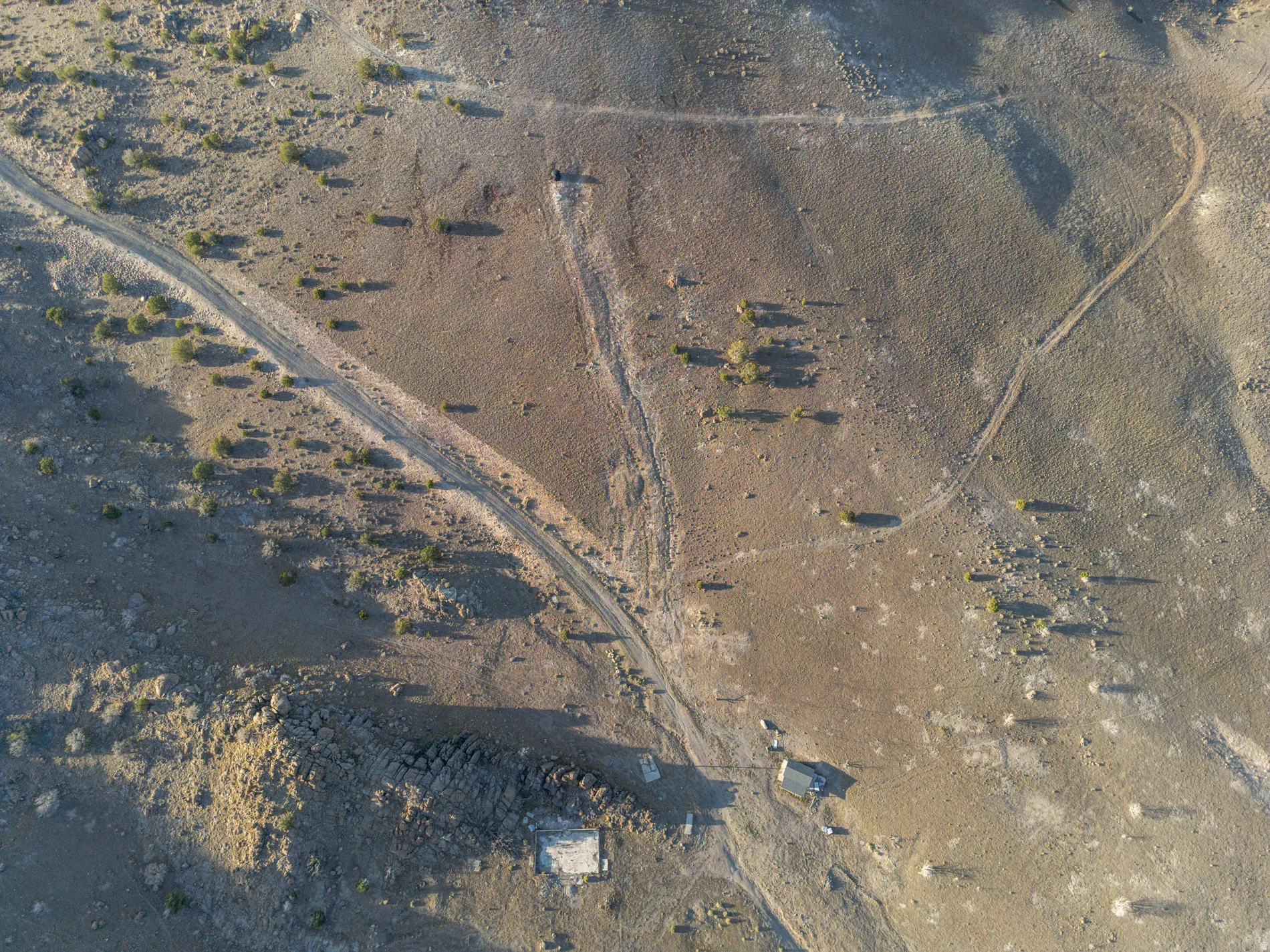 Aerial view of property's location with a desert landscape and rural landscape