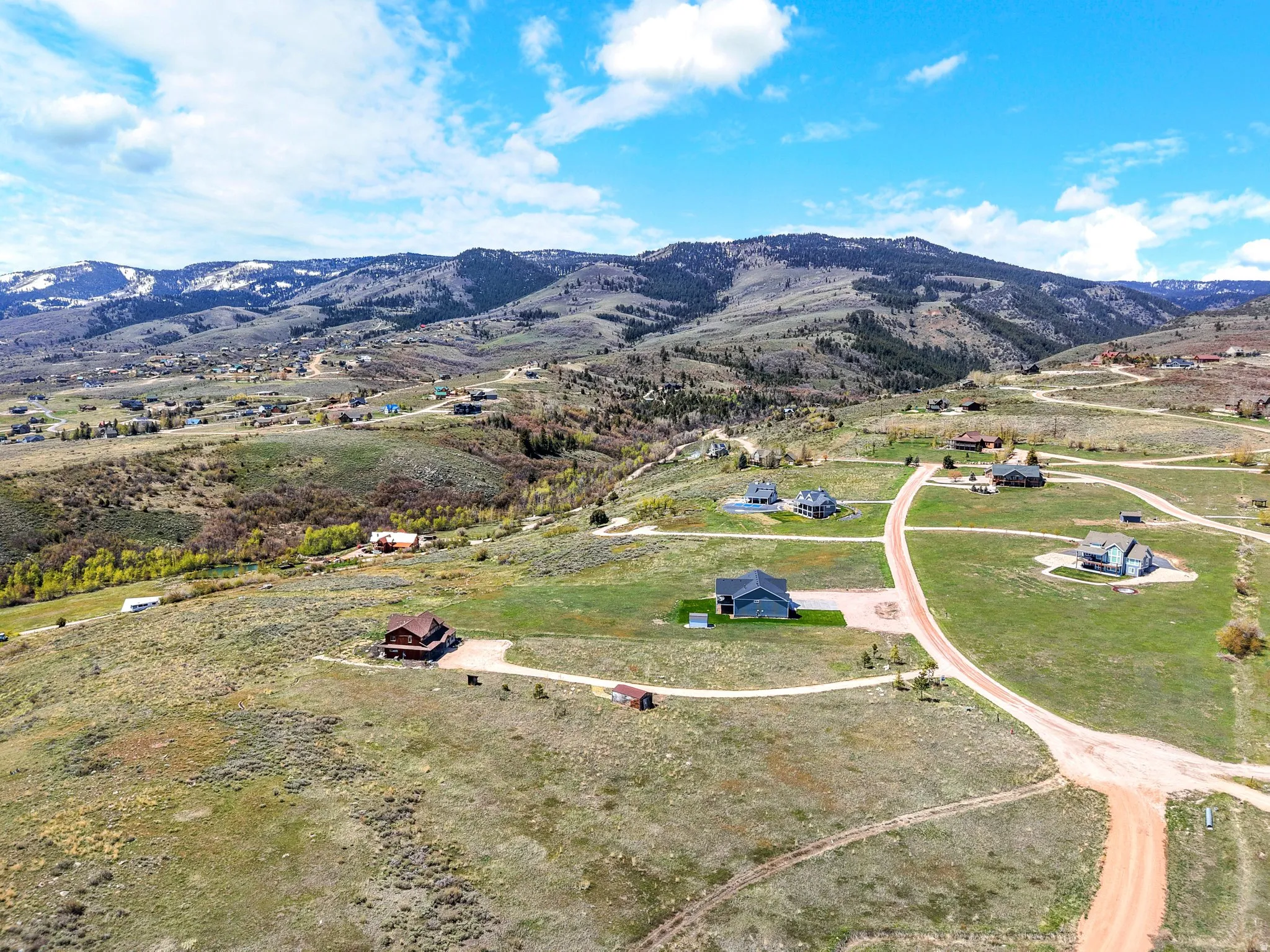 View of property location with a mountain backdrop and rural landscape