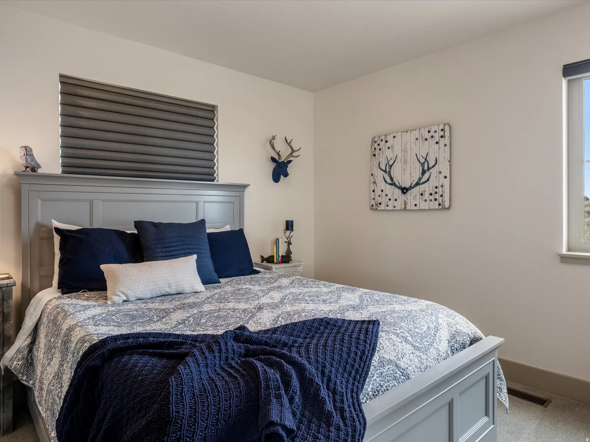 Bedroom with carpet and baseboards