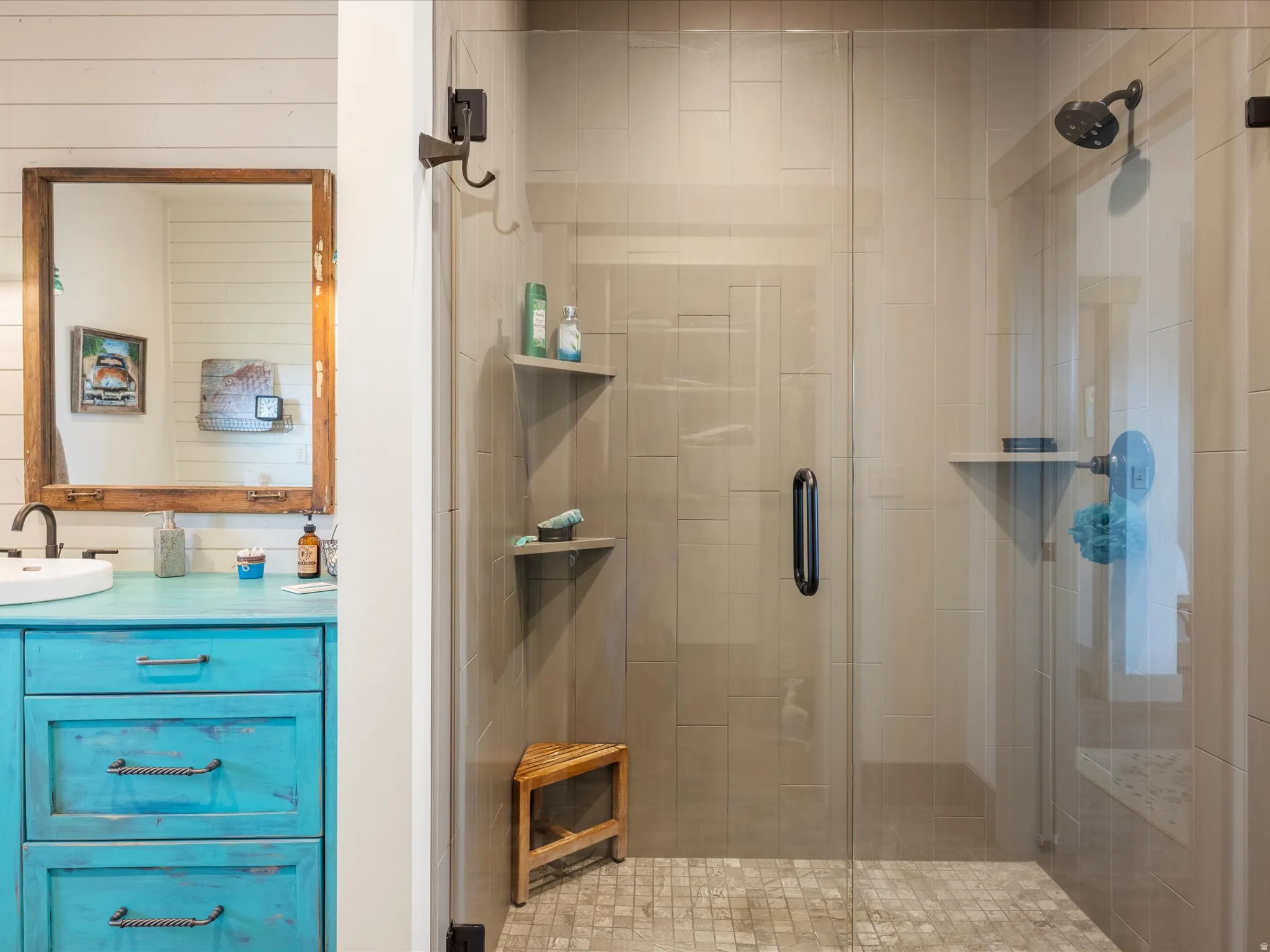 Ensuite  bath with vanity and a shower stall