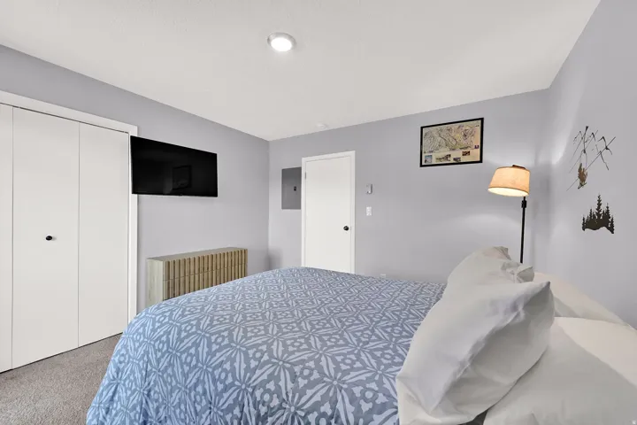 Bedroom 1 with access to the deck