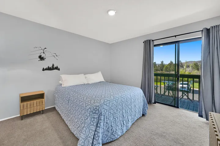 Bedroom 1 with access to the deck