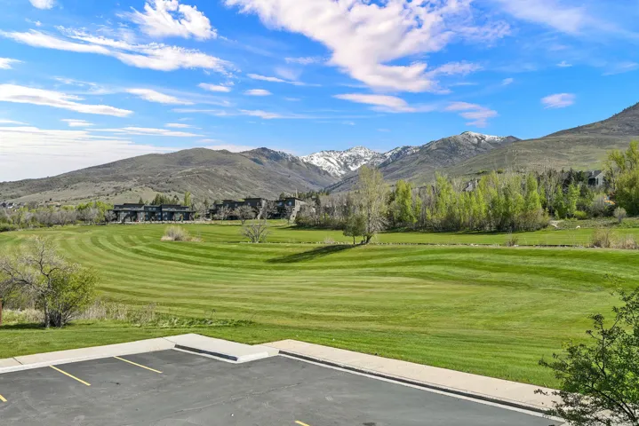 View of mountain backdrop with a local golf course