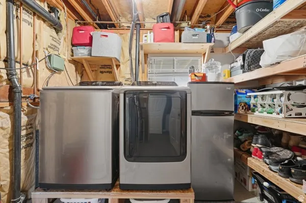 Laundry area featuring washing machine and dryer