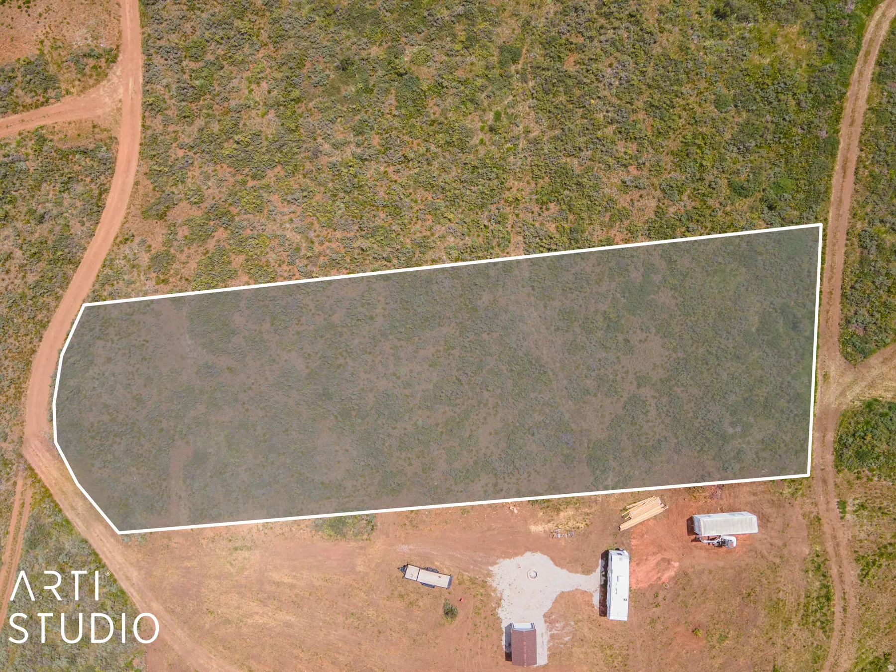Aerial overview of property's location featuring property parcel outlined