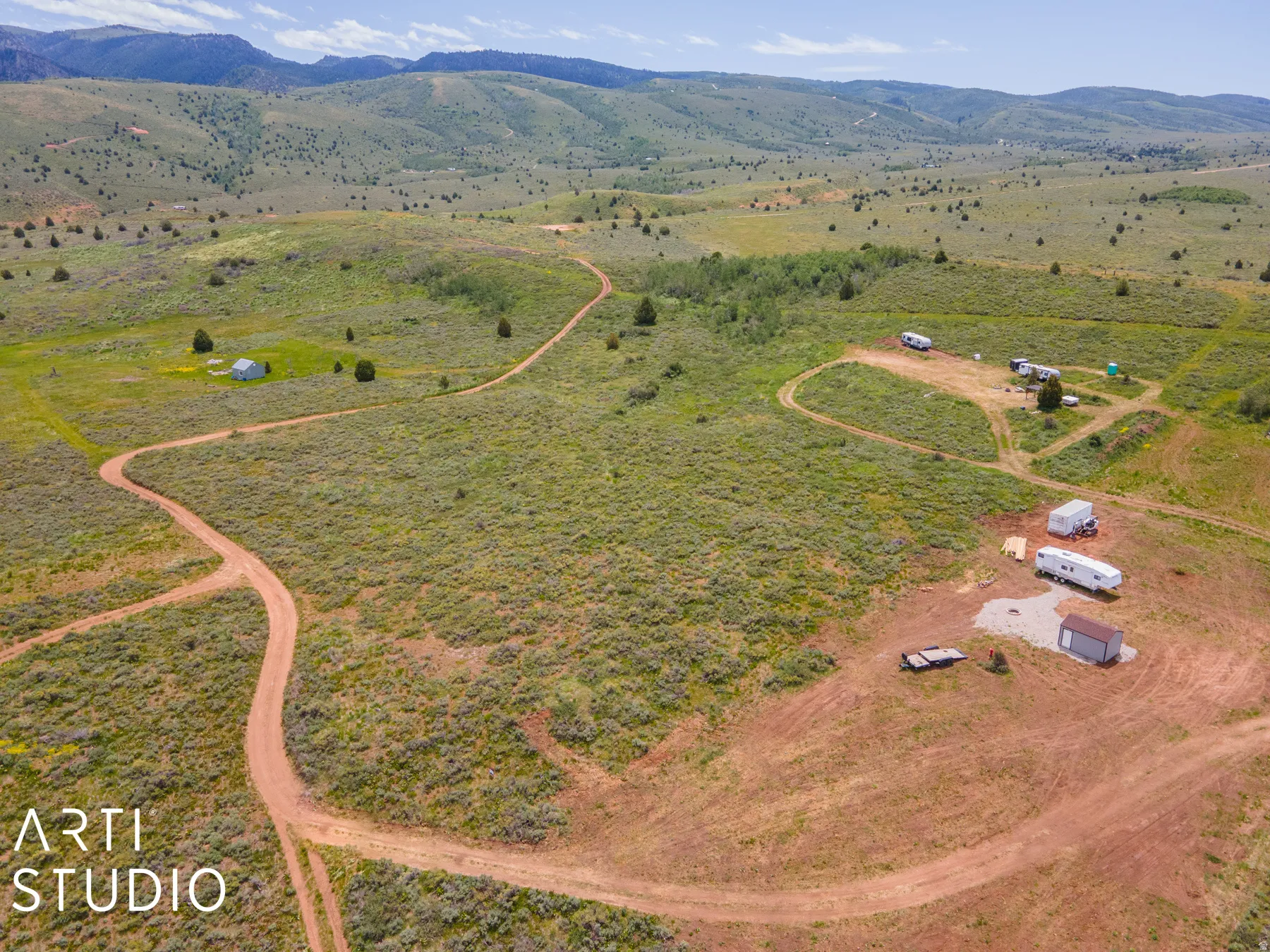 Aerial view of sparsely populated area with mountains