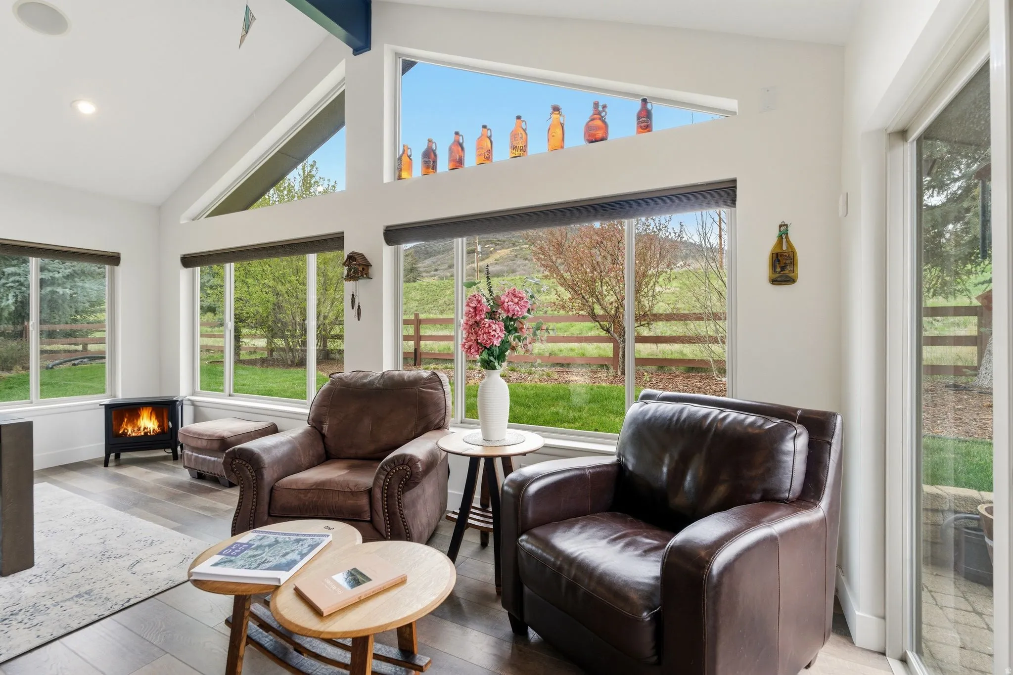 Sunroom featuring plenty of natural light and beam ceiling