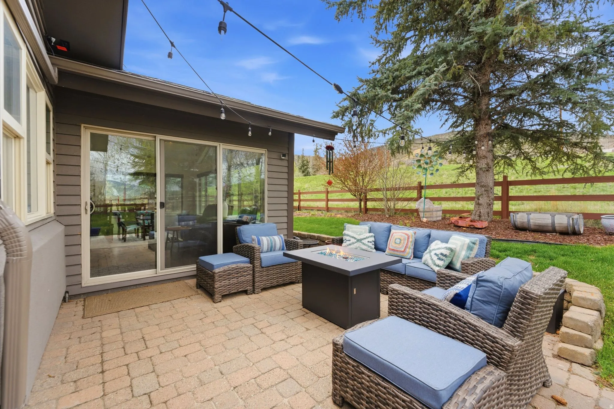 View of patio / terrace featuring an outdoor living space with a fire pit