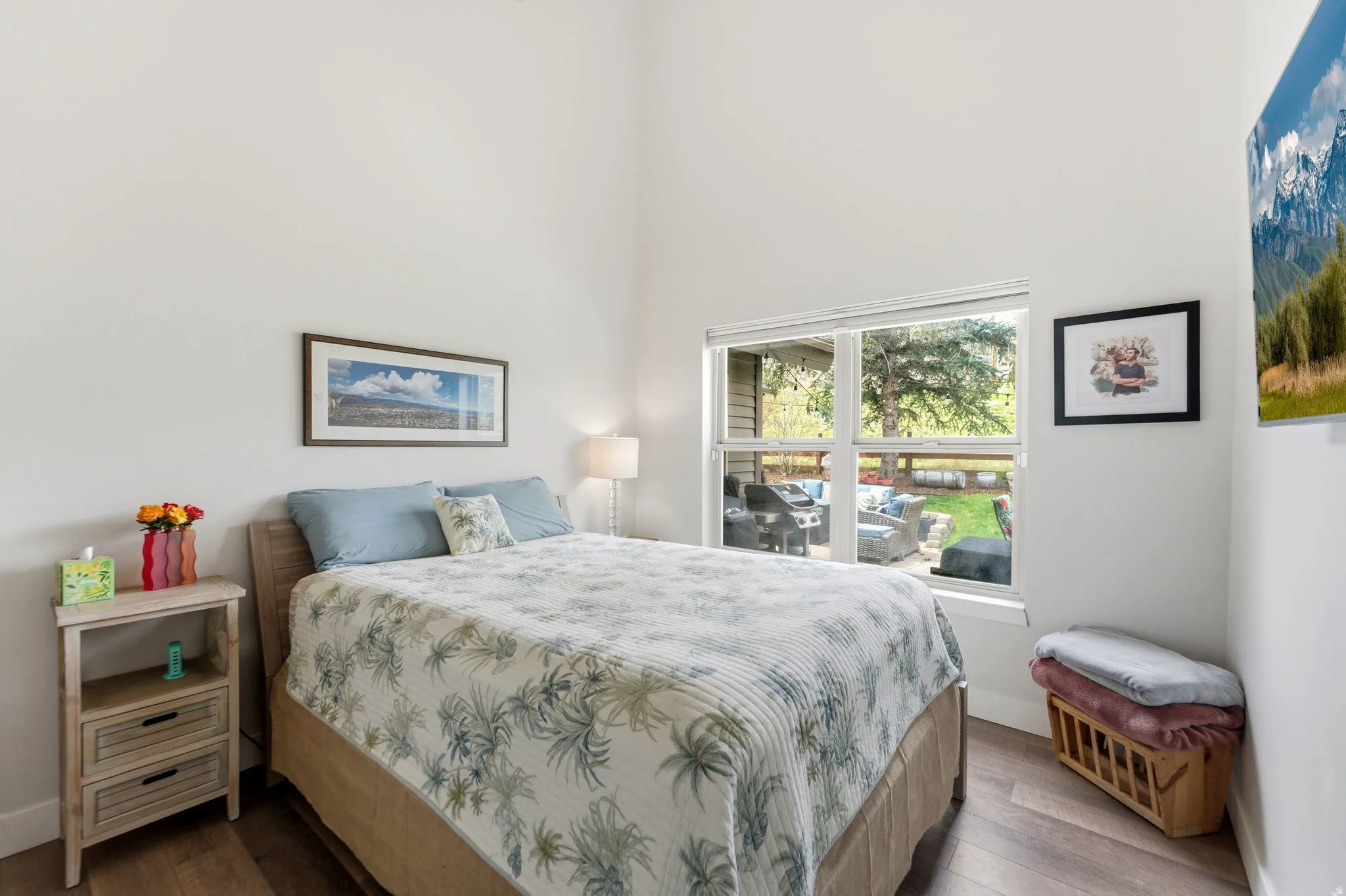 Bedroom with dark wood-style floors