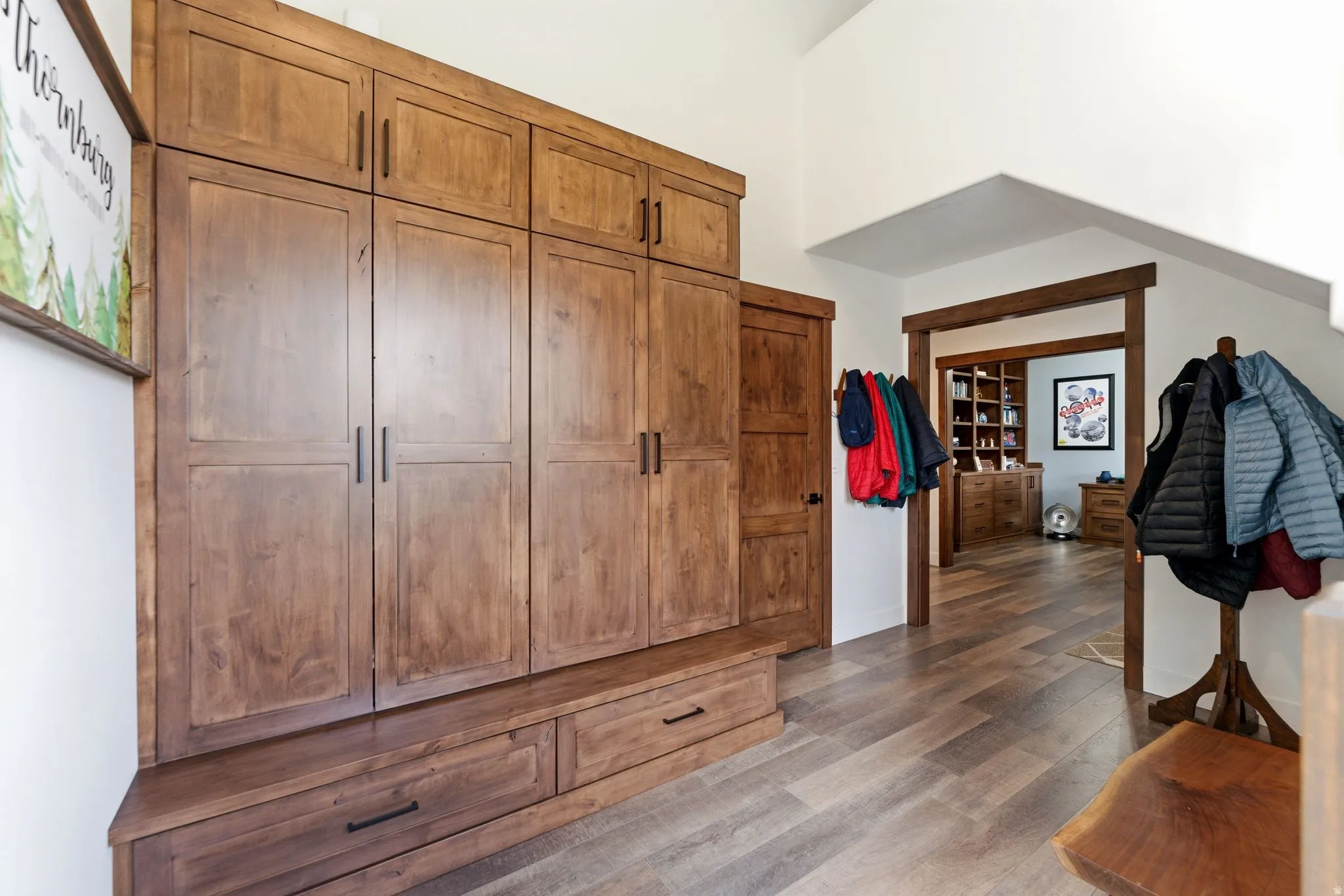 Mudroom featuring dark wood finished floors