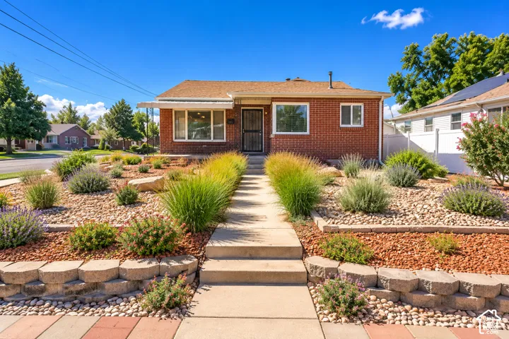 Established xeriscaping creates attractive, low-maintenance curb appeal.