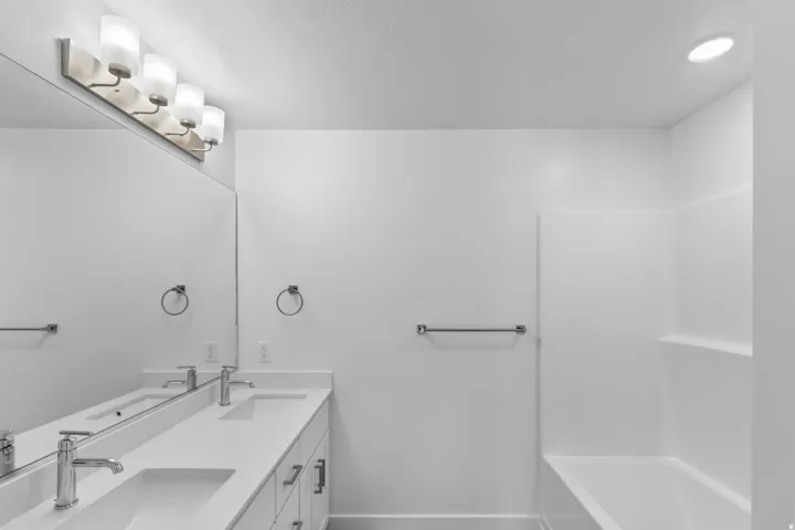 Bathroom featuring double vanity