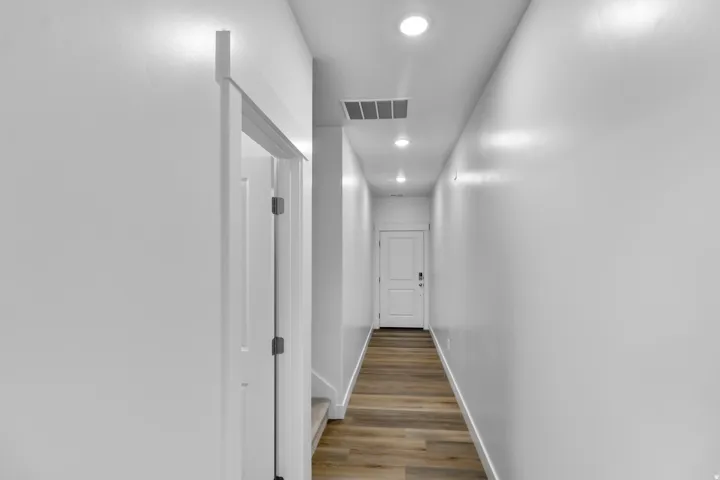 Hall featuring recessed lighting and light wood finished floors