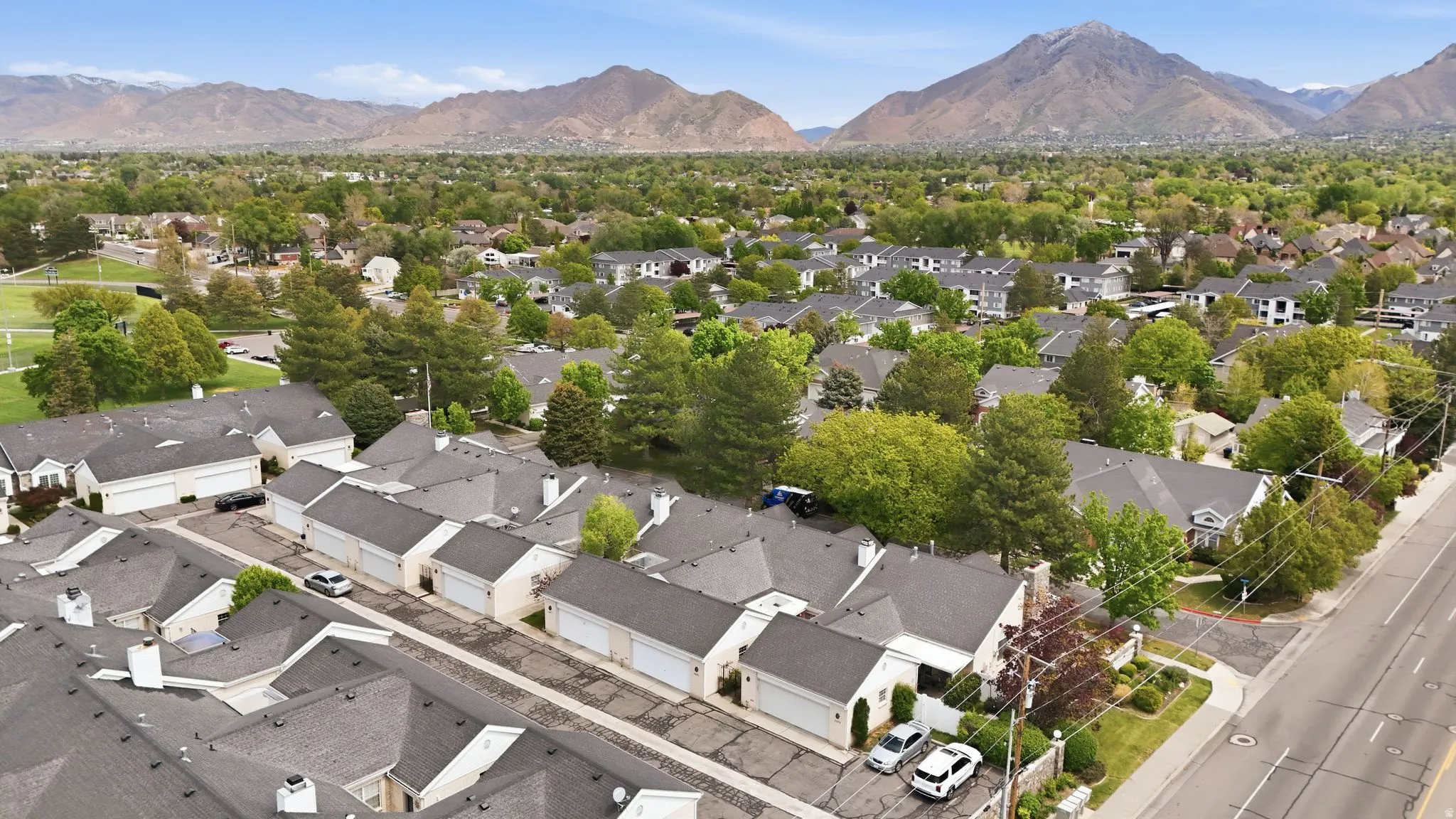 Aerial view of residential area with a mountain backdrop