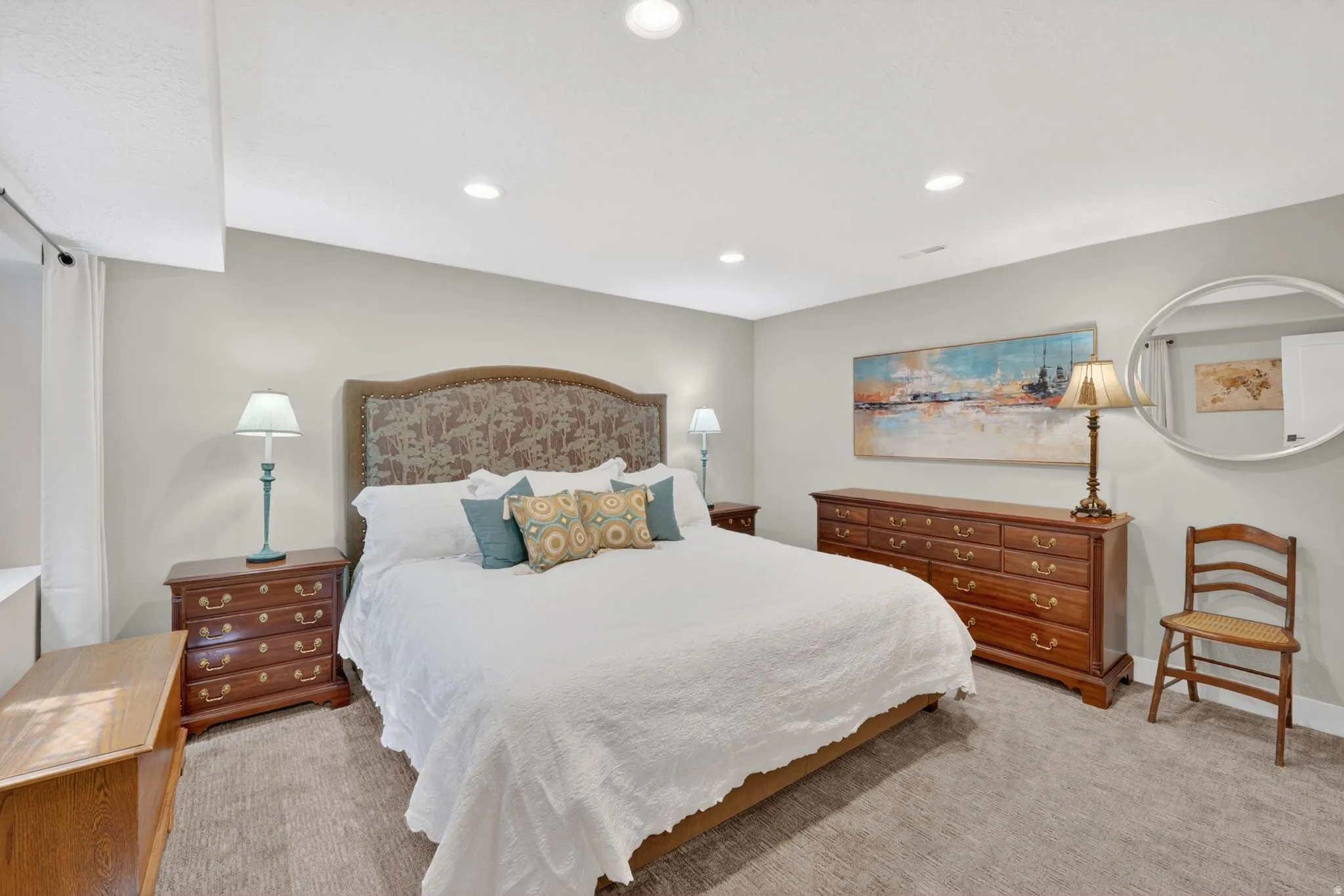 Bedroom with recessed lighting and light colored carpet