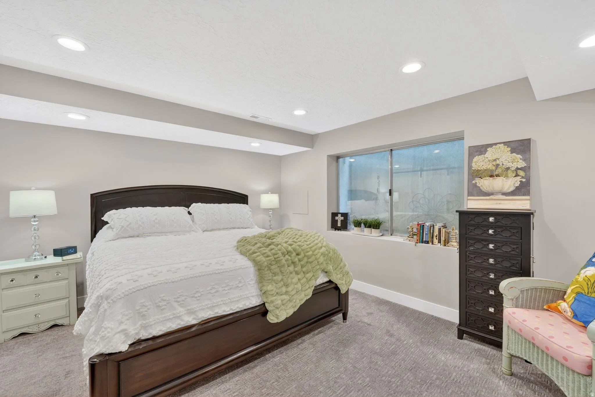 Bedroom featuring light colored carpet and recessed lighting