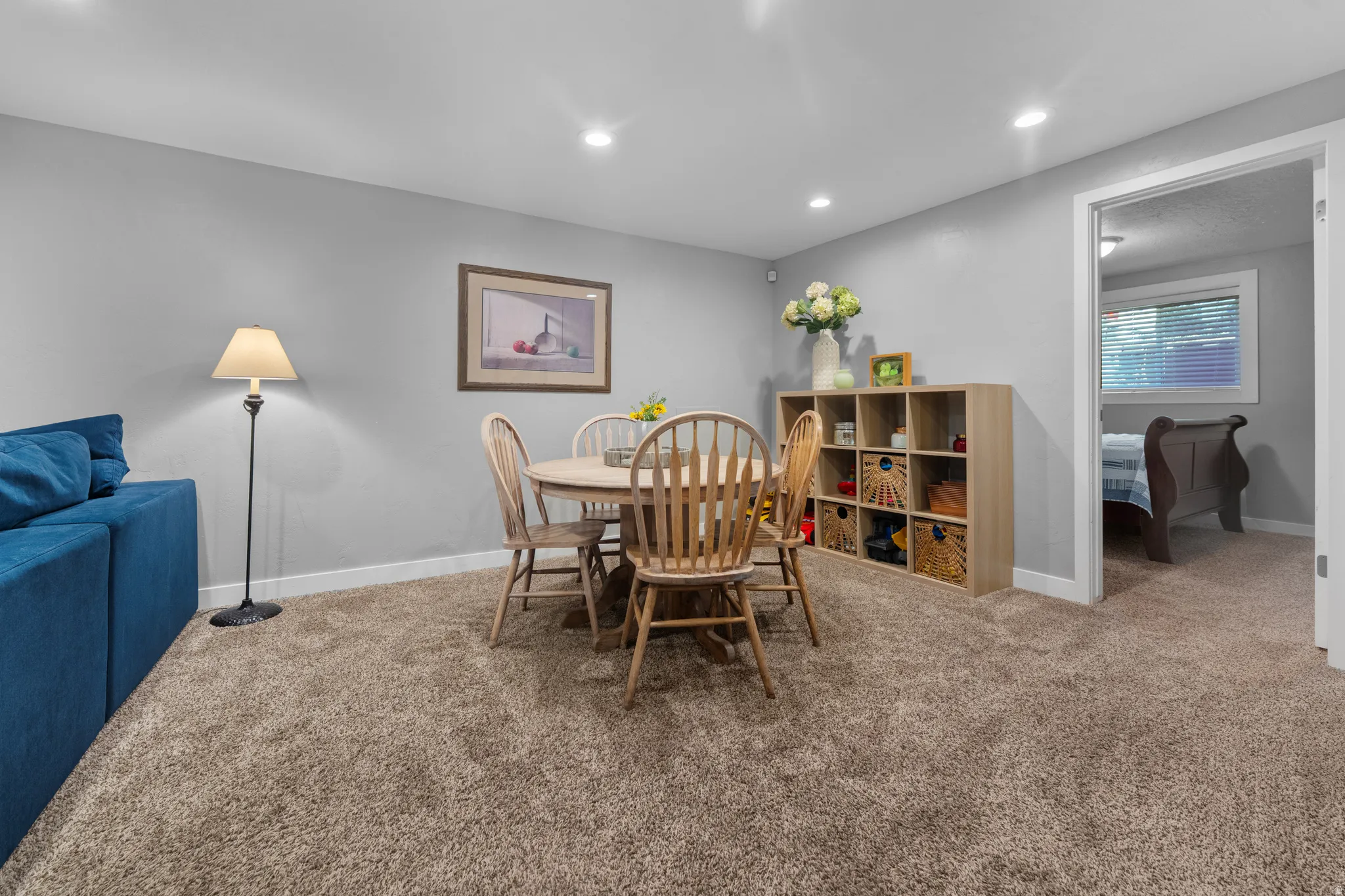 Dining room featuring carpet flooring and recessed lighting