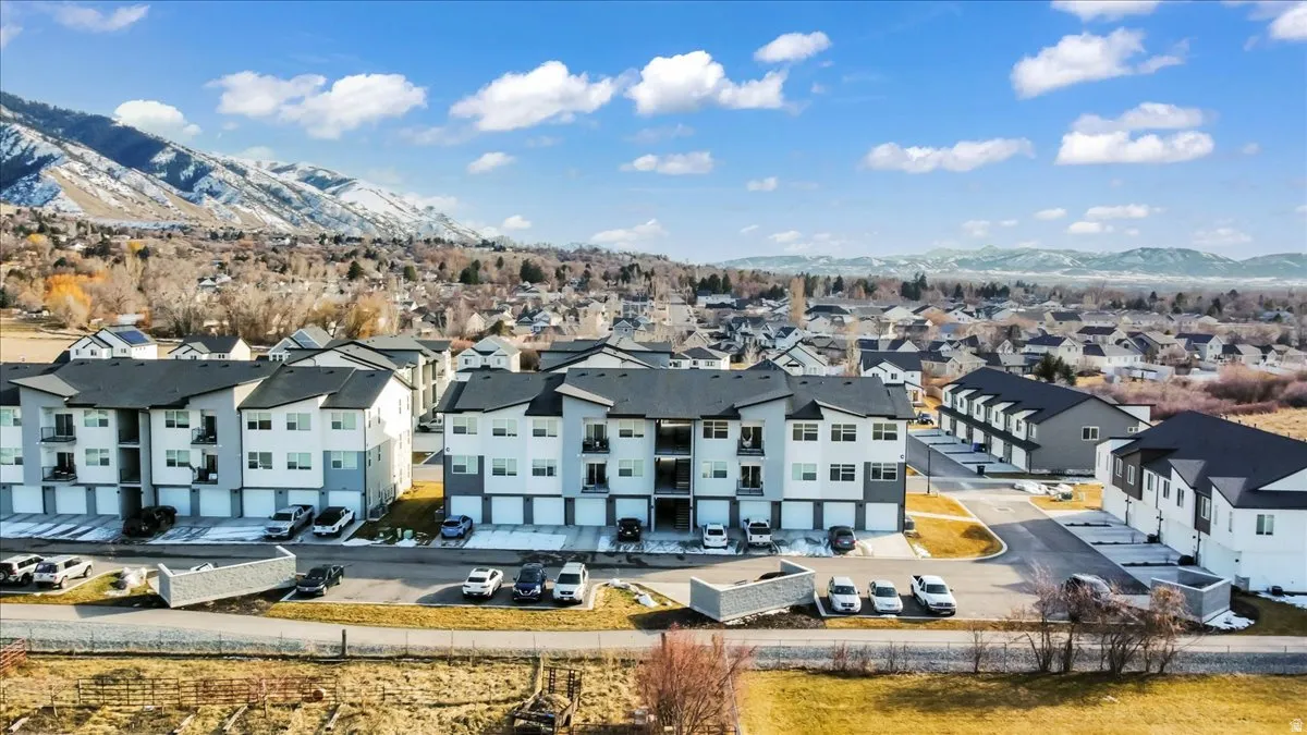 Aerial view of residential area featuring mountains