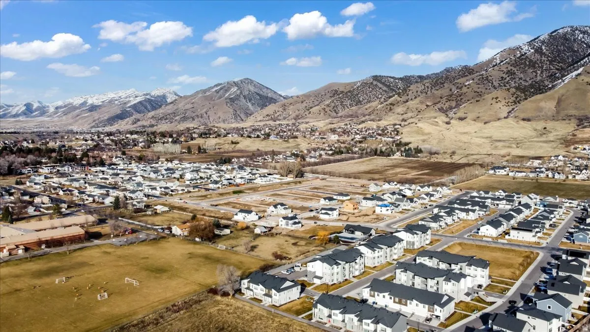Aerial perspective of suburban area with mountains