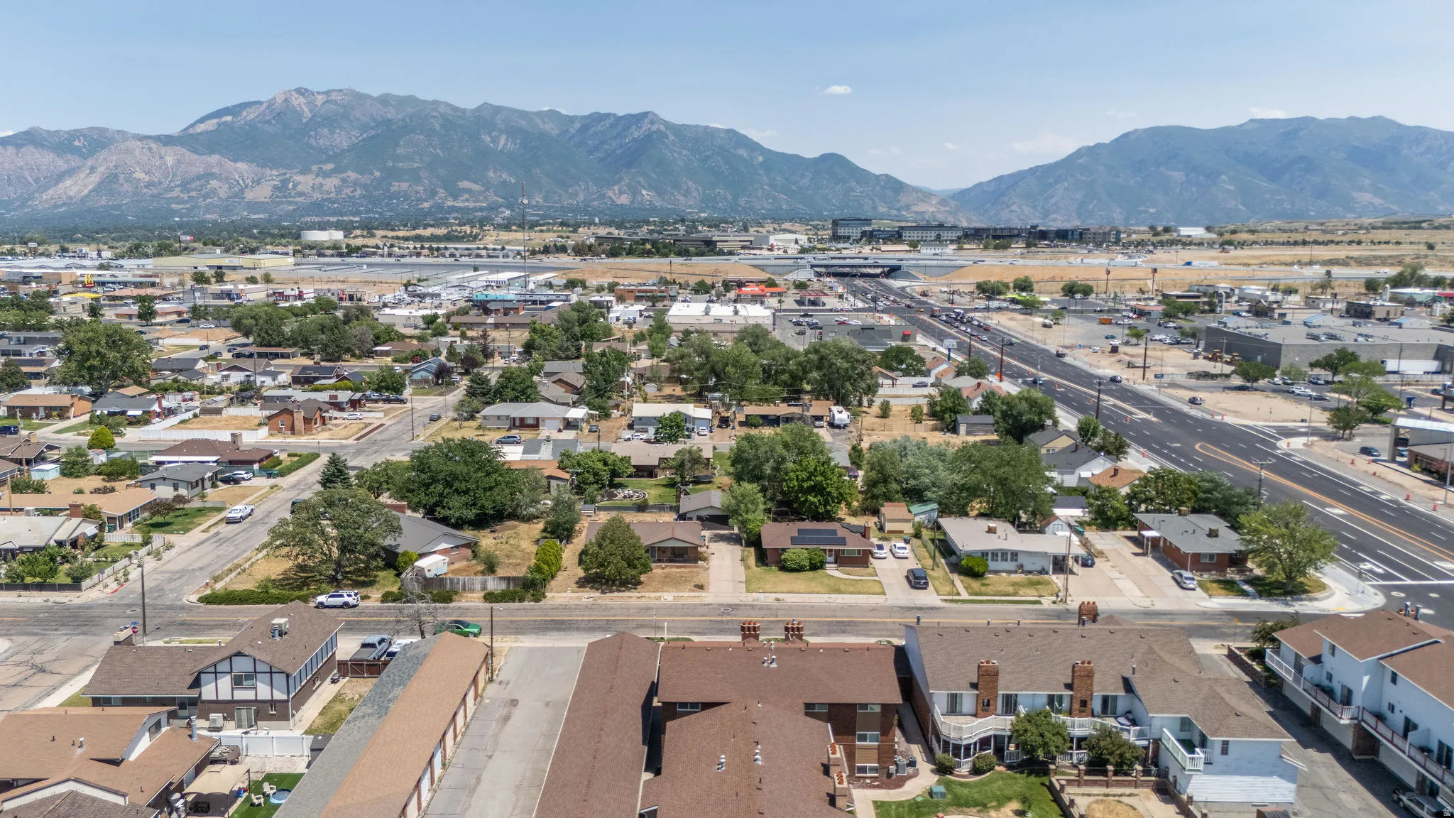Aerial perspective showcasing an expansive residential area with varied housing styles