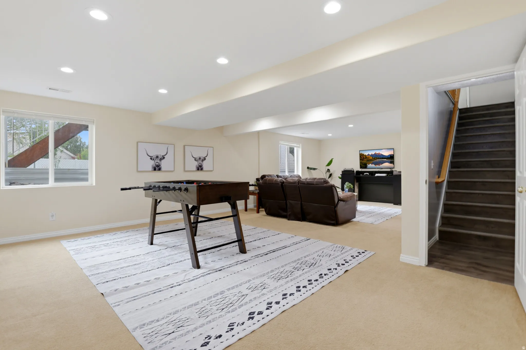 Game room featuring light carpet and recessed lighting