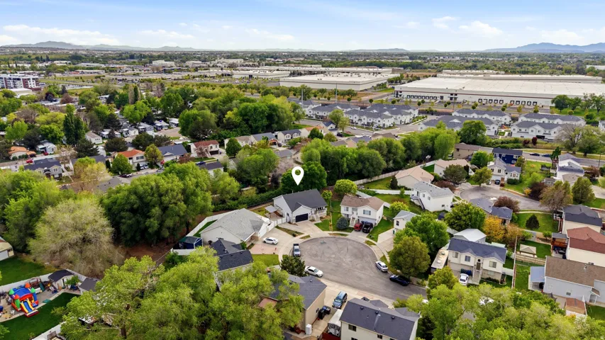 Aerial perspective of suburban area featuring mountains