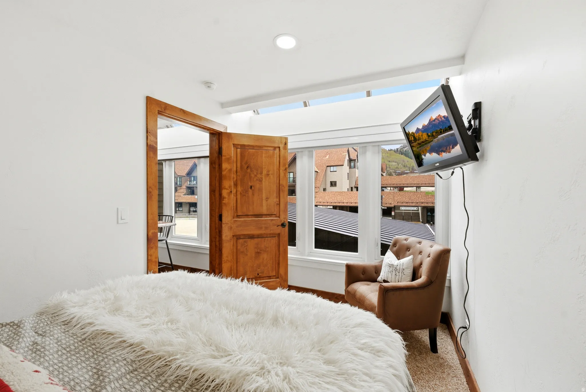 Carpeted bedroom featuring recessed lighting