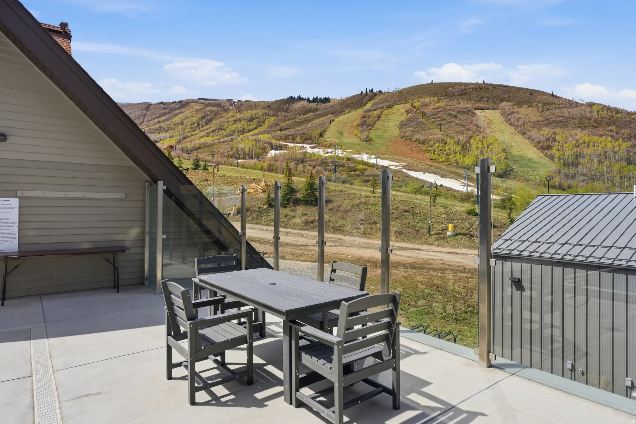 View of patio / terrace with outdoor dining area and a mountain view