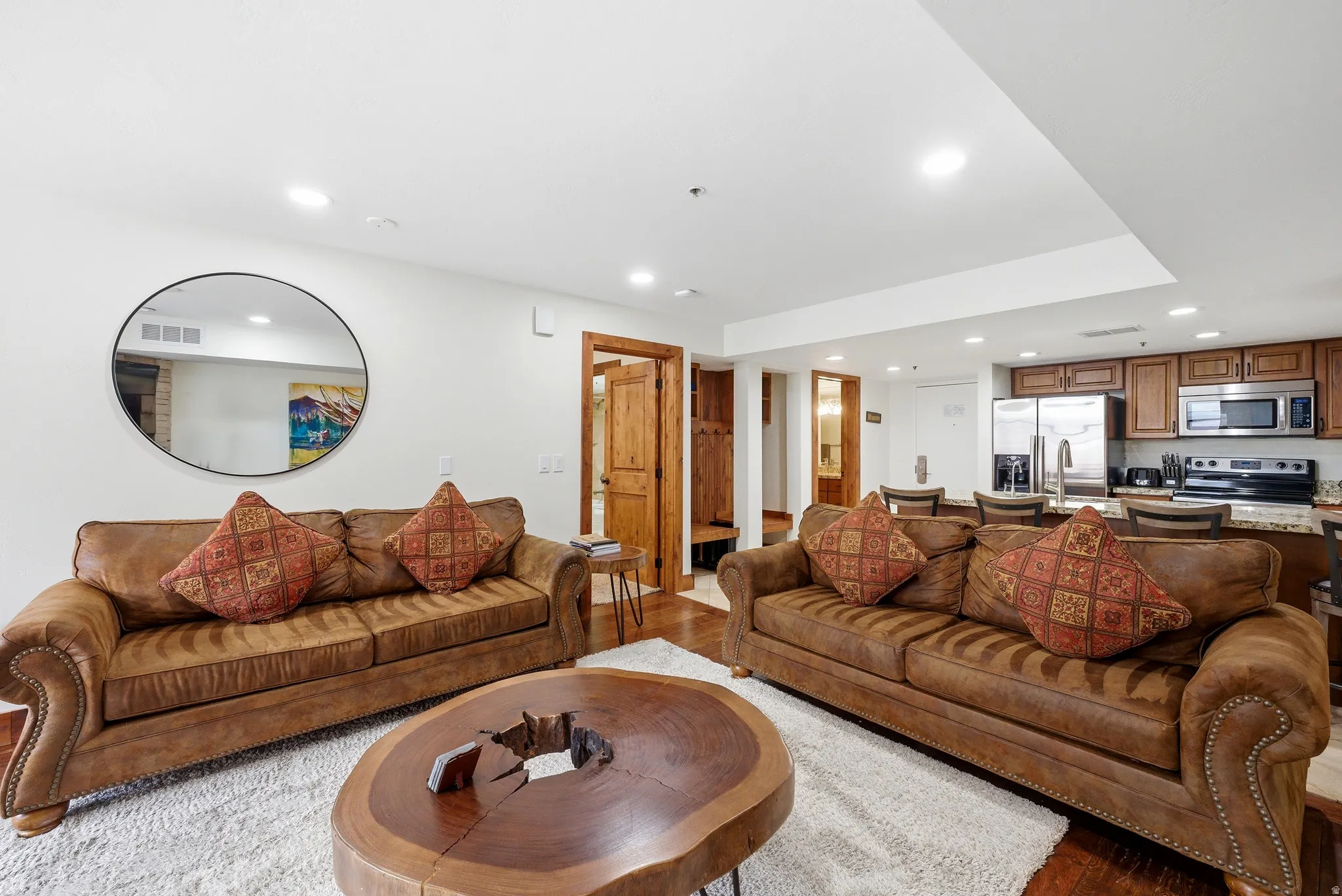 Living area featuring recessed lighting and light wood finished floors