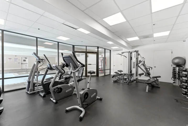 Exercise room featuring a drop ceiling