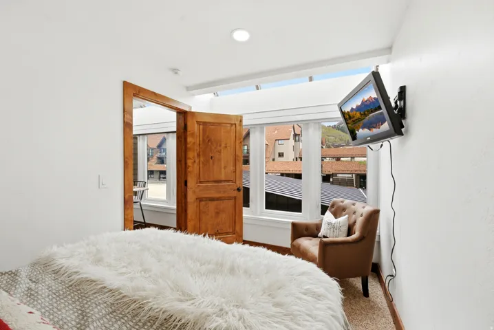 Carpeted bedroom featuring recessed lighting