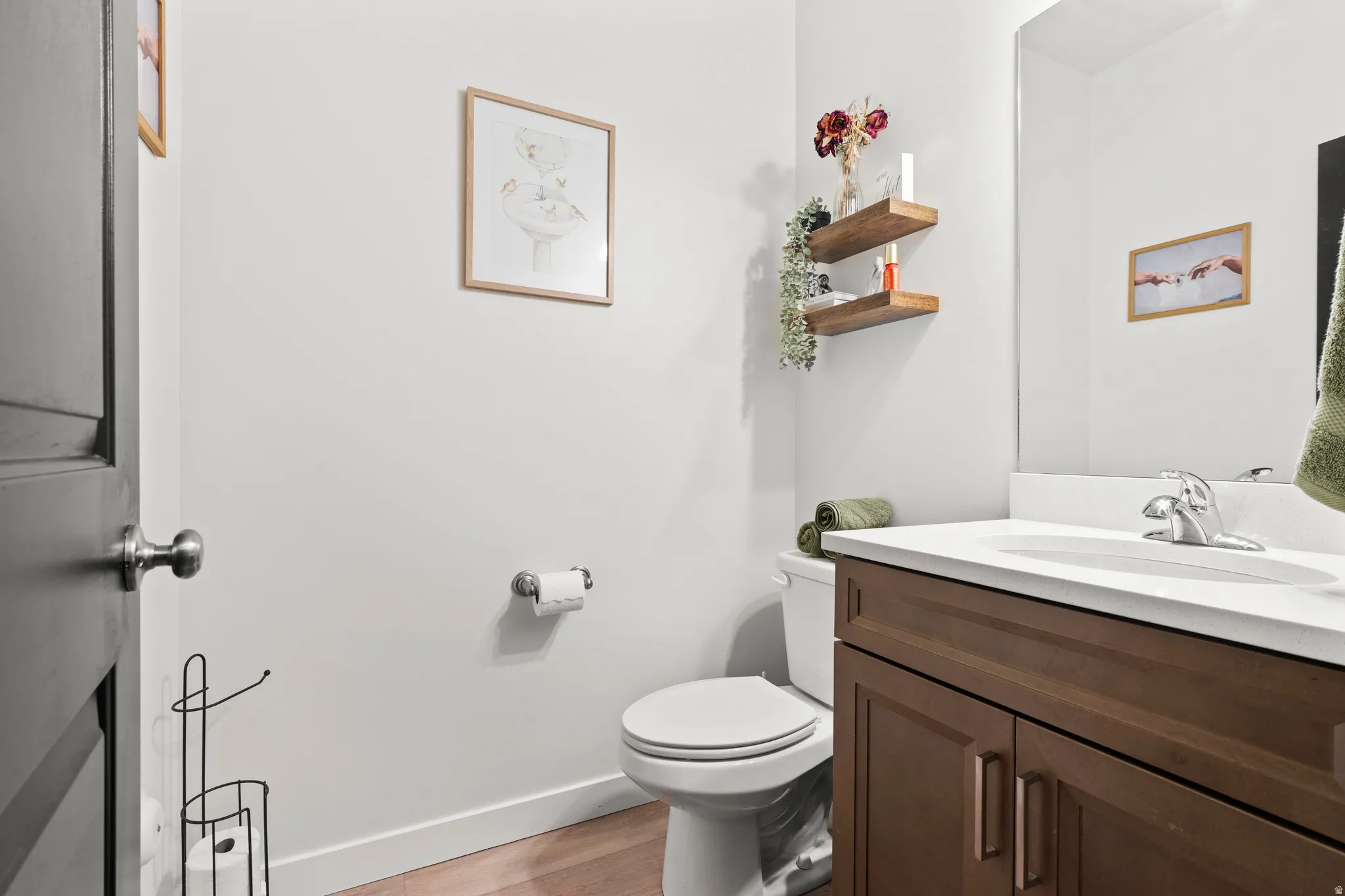Bathroom with vanity and light wood-type flooring