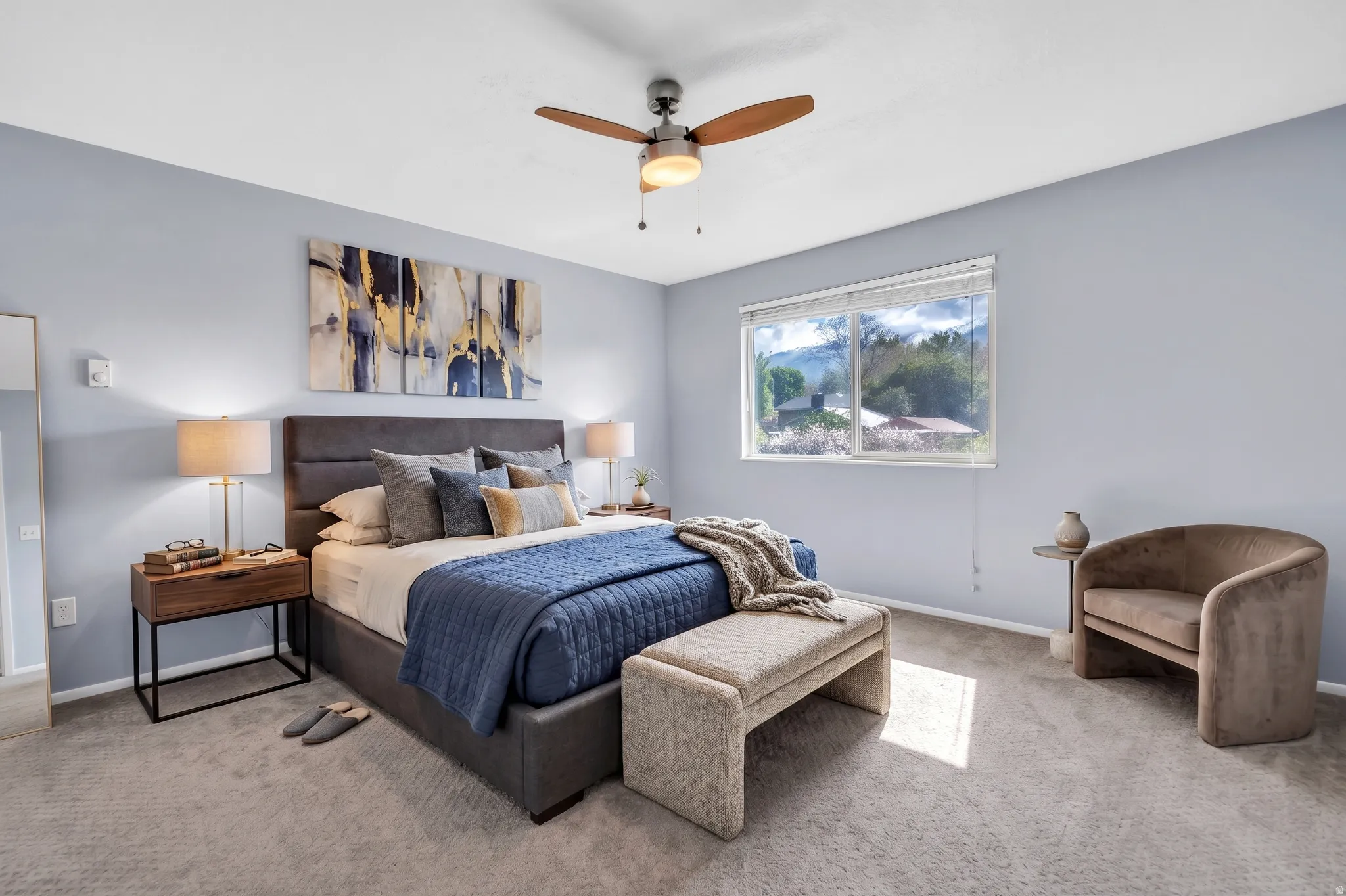 Bedroom featuring carpet flooring and ceiling fan