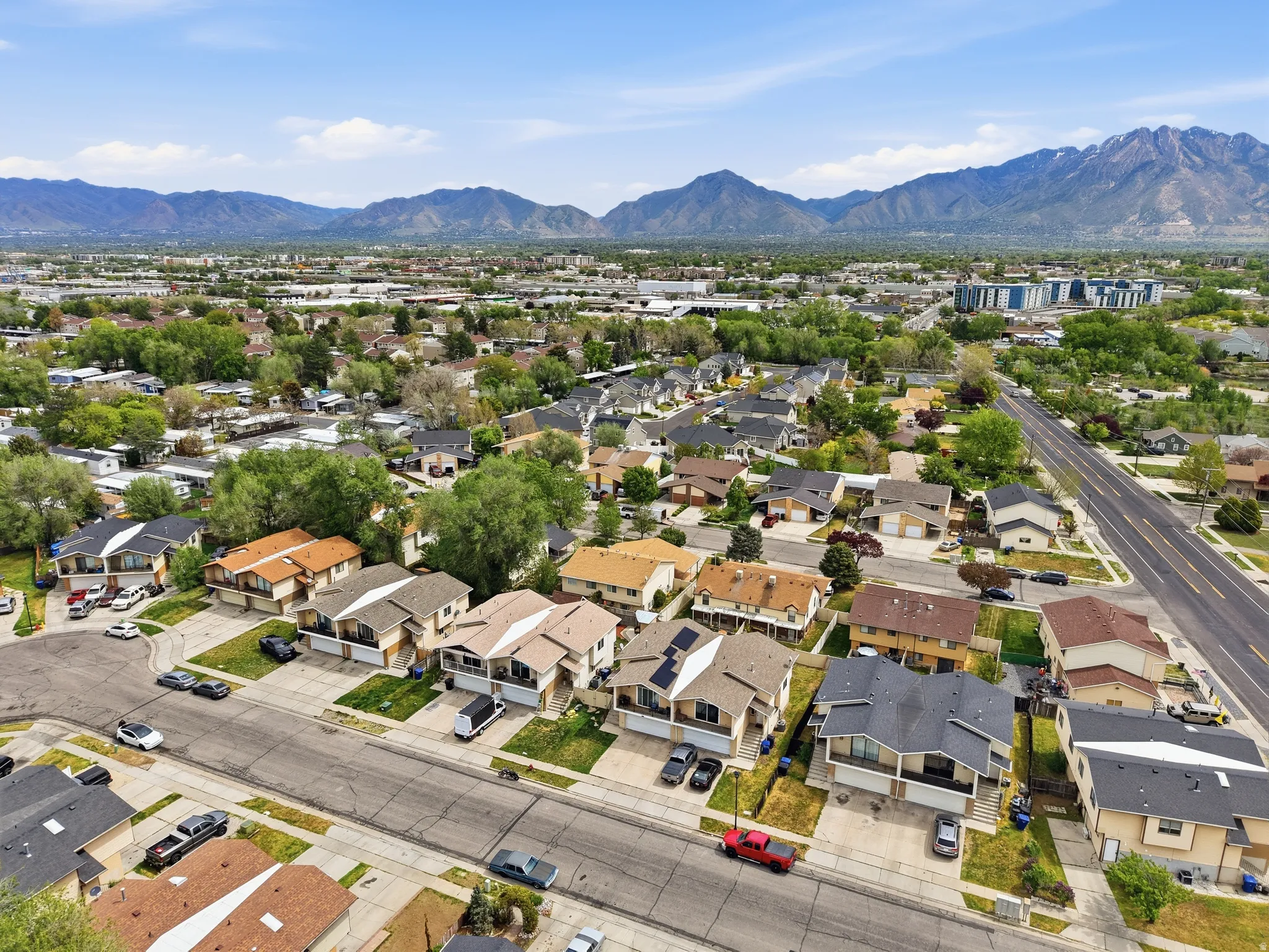 Aerial view of residential area with mountains
