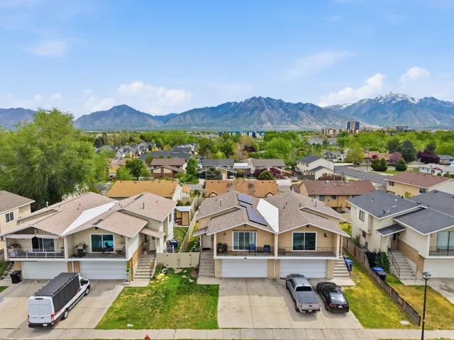 Aerial view of residential area with a mountainous background