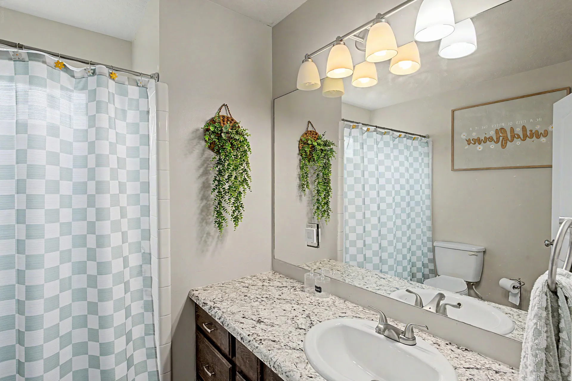 Full bath featuring vanity and a shower with curtain