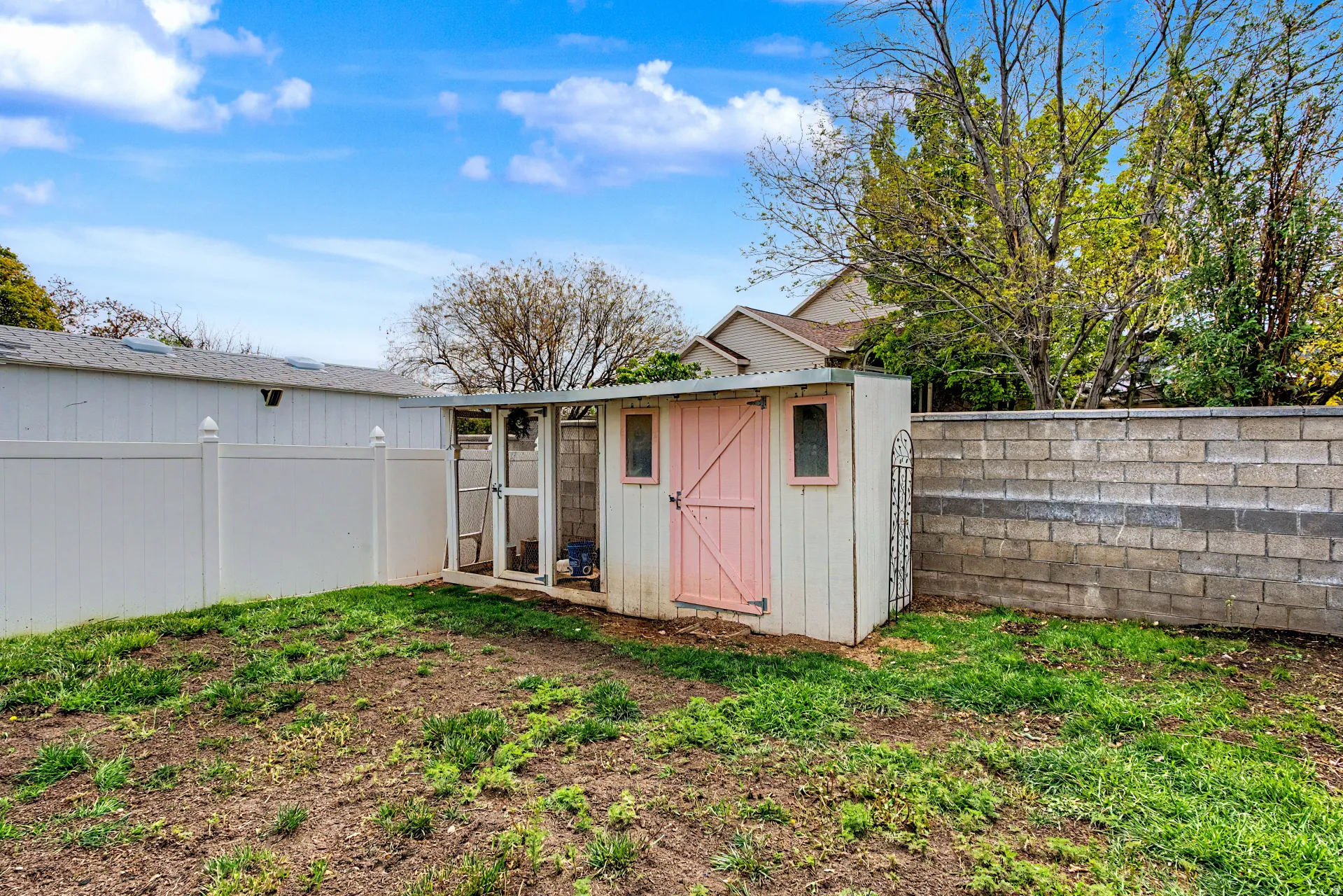 View of shed featuring a fenced backyard
