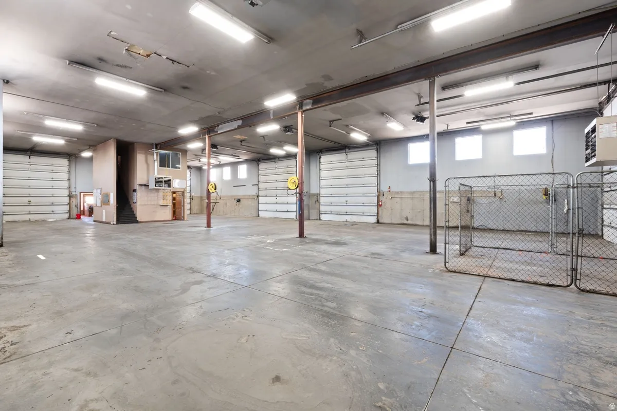 Garage featuring a heating unit