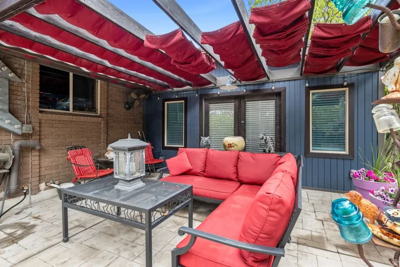 View of patio with an outdoor living space