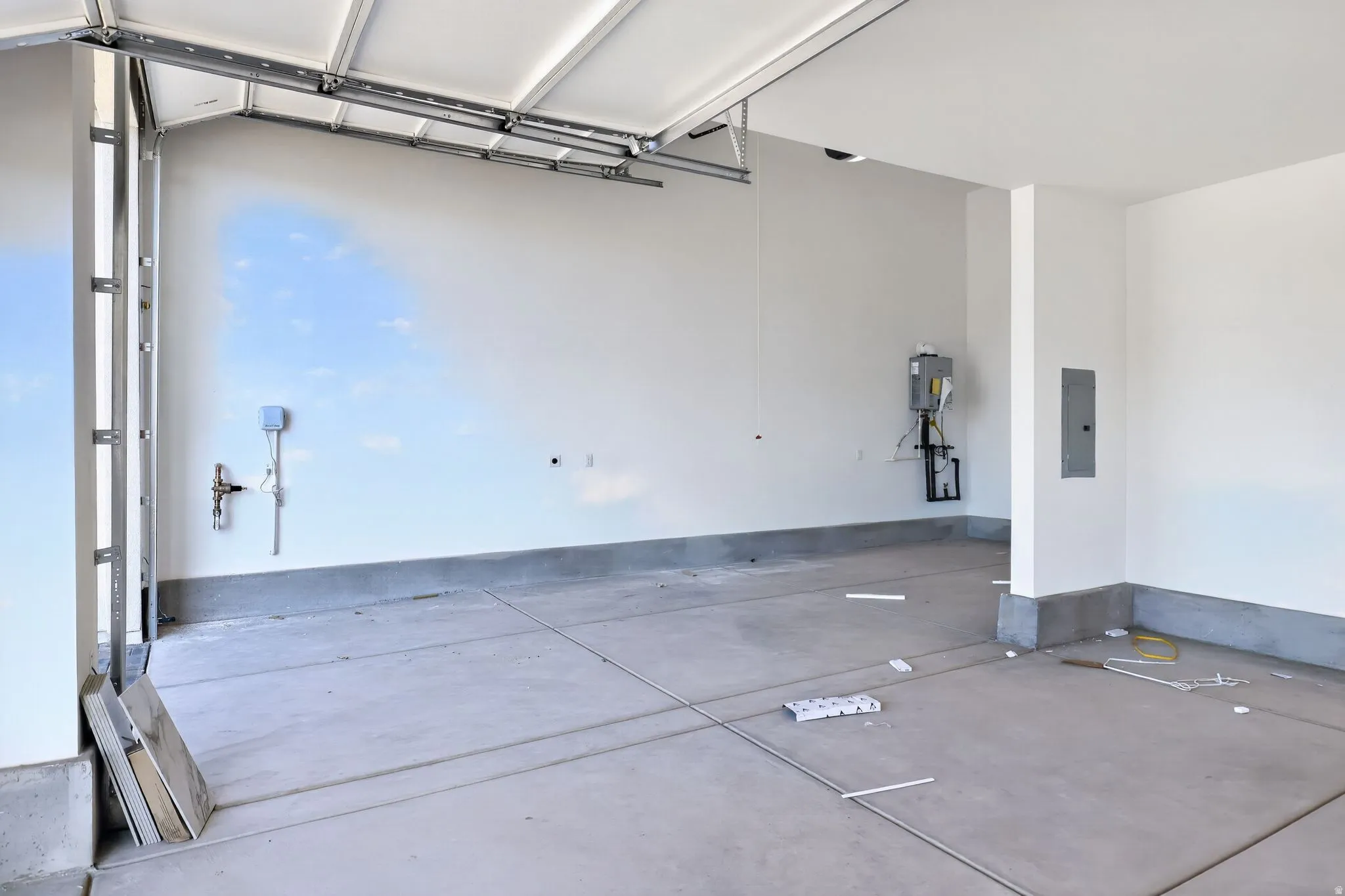 Garage featuring electric panel